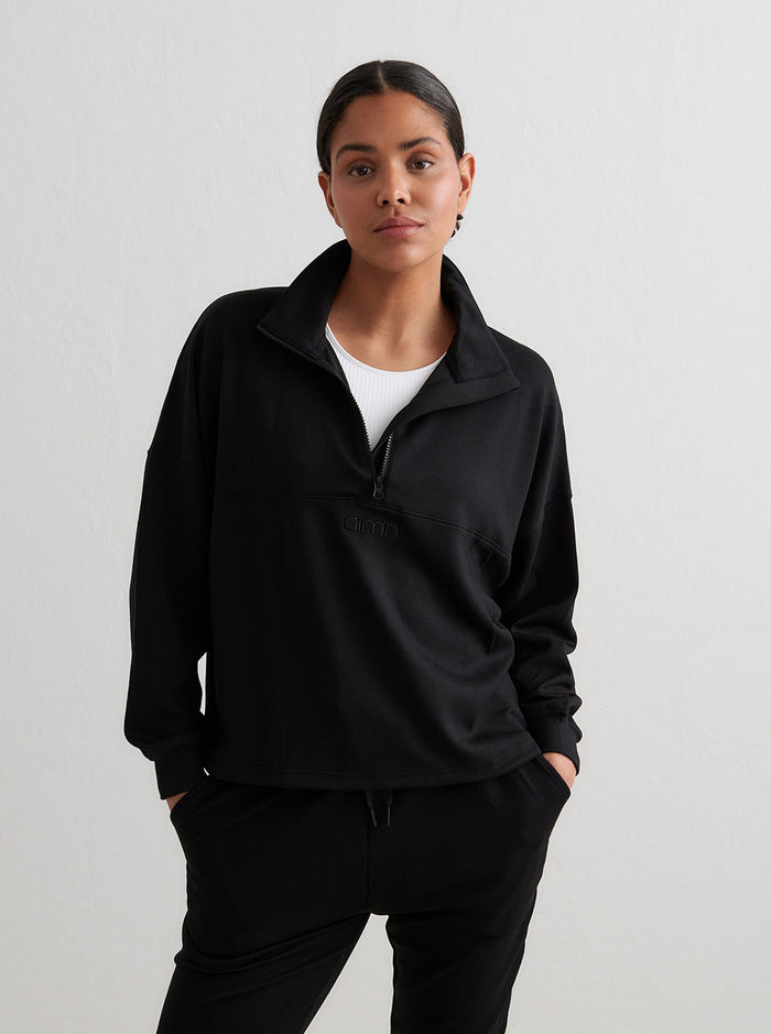 Comfy Modal Half Zip in Black