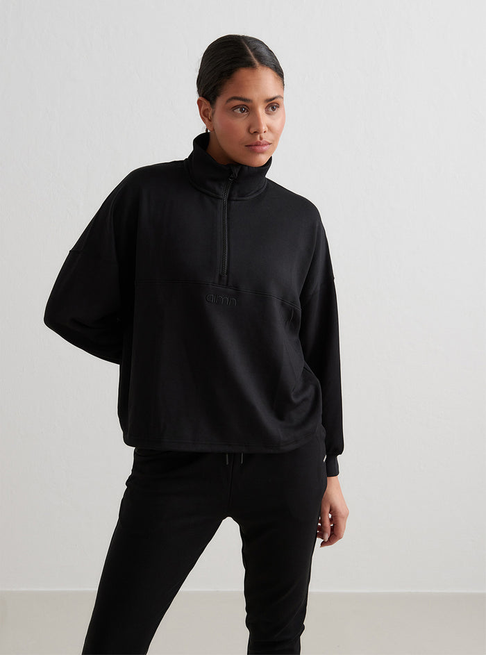 Comfy Modal Half Zip in Black