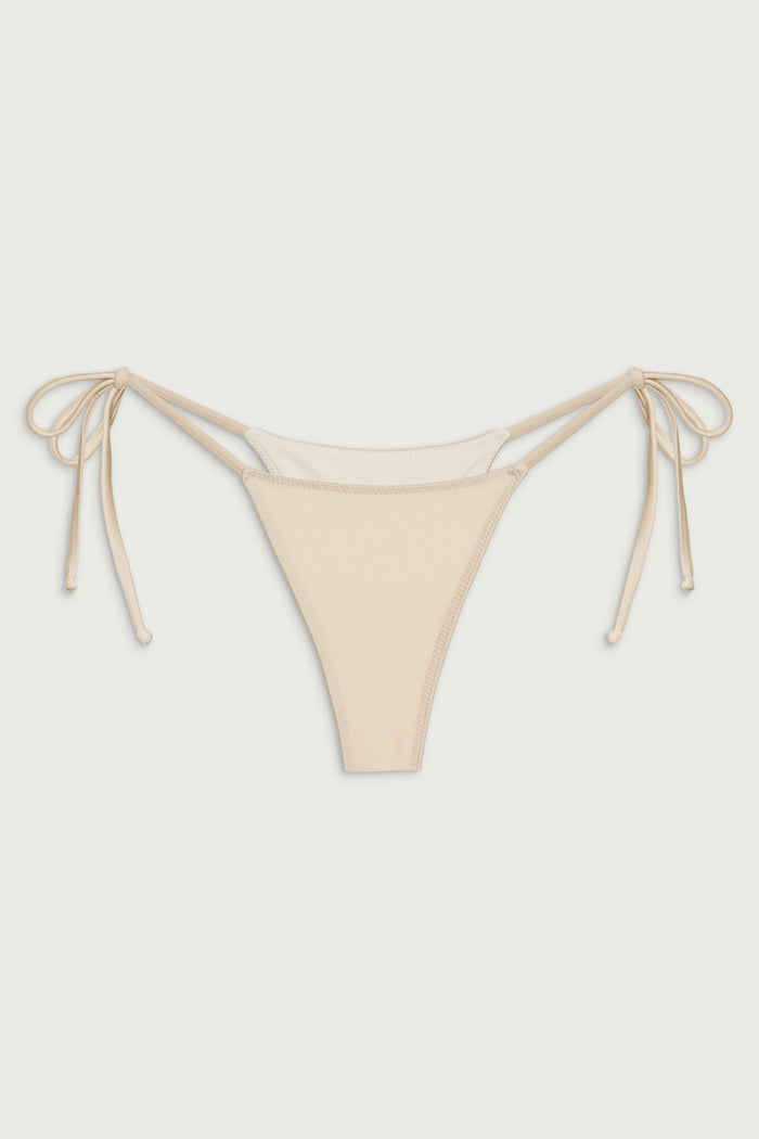 Divine skimpy bikini bottom sand castle